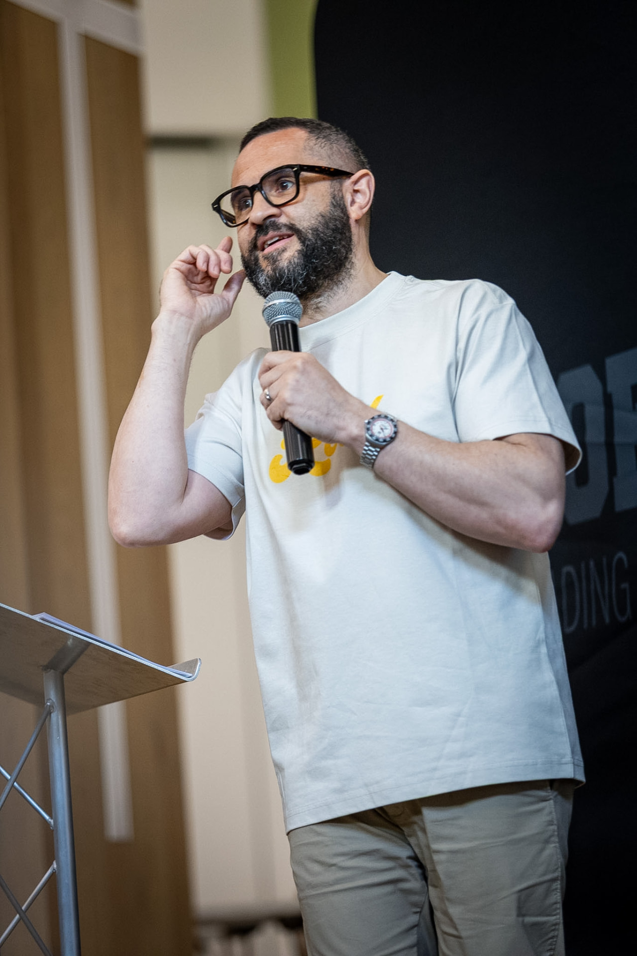A speaker teaching from the front at Made for Dominion